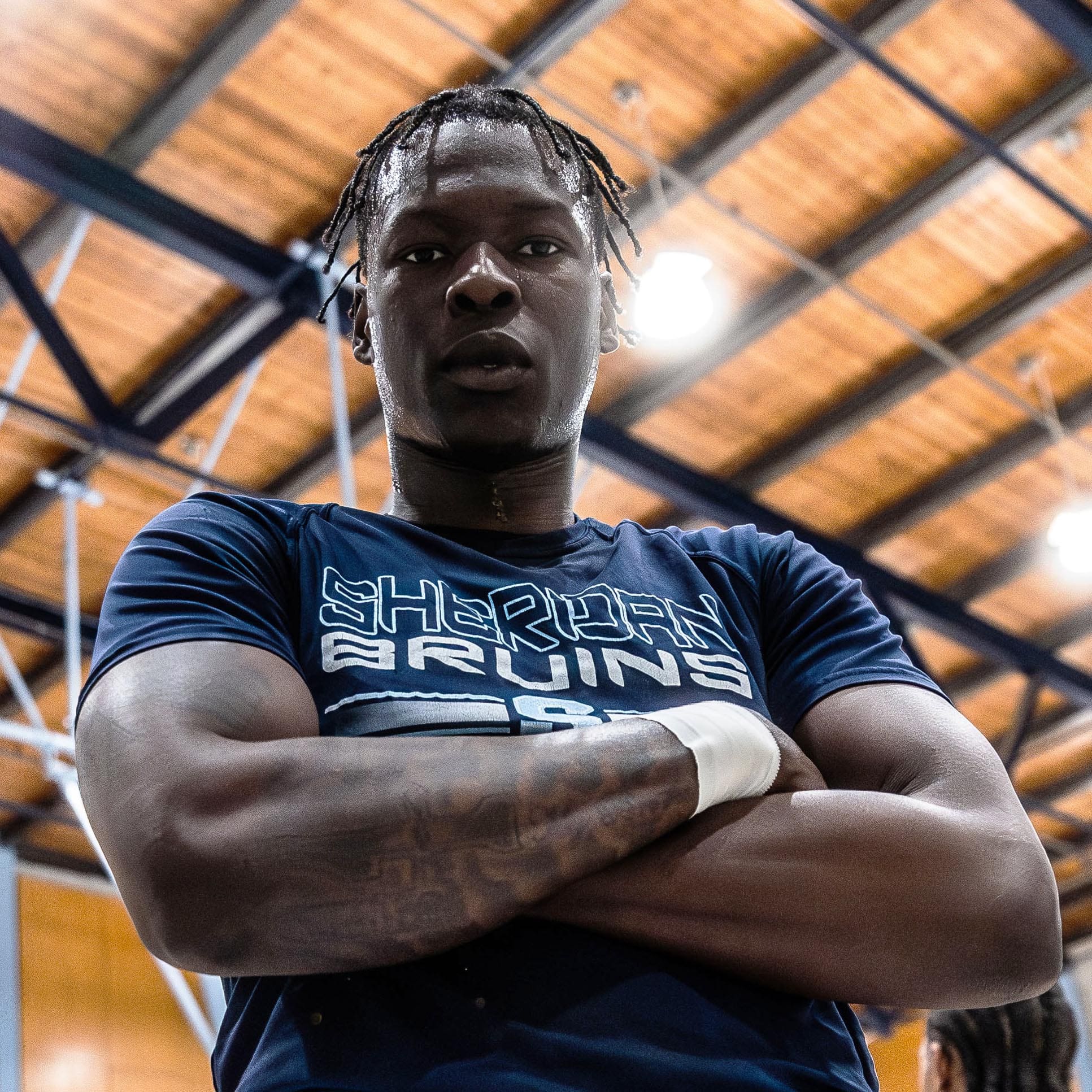 BRAMPTON, ON – JAN. 27, 2024: Christo Ugodo of the Sheridan Bruins poses for the camera during warm-ups. BRAMPTON, ON – JAN. 27, 2024: Christo Ugodo of the Sheridan Bruins poses for the camera during warm-ups.